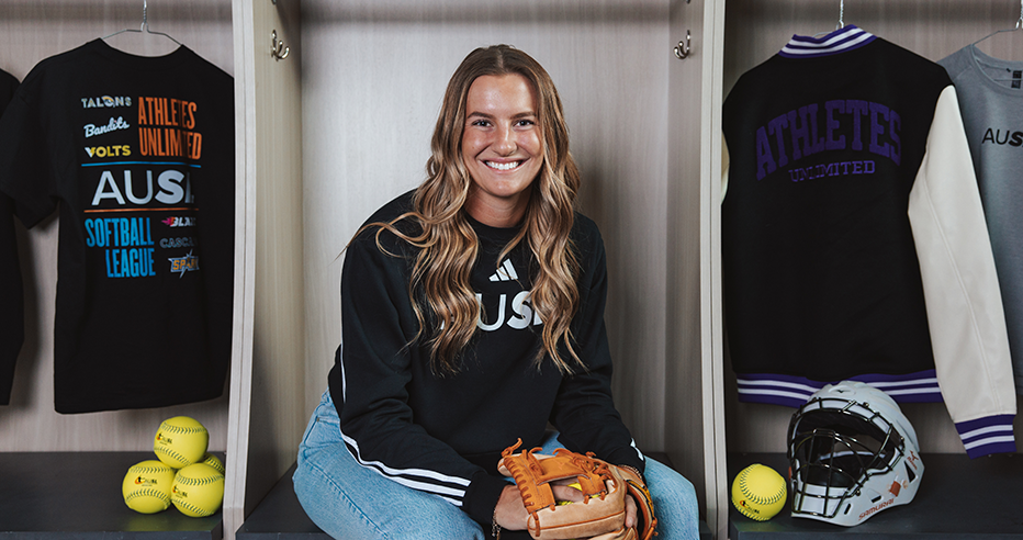 AUSL Golden Ticket recipient Reese Atwood smiles as she dons league gear.