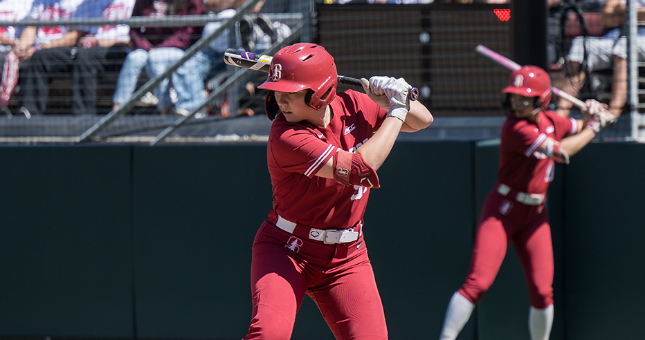 Stanford infielder Taryn Kern received an AUSL Golden Ticket on Friday, April 10. In the photo, Kern is at the plate during a game, preparing to swing while wearing the Cardinal’s red uniform and helmet.