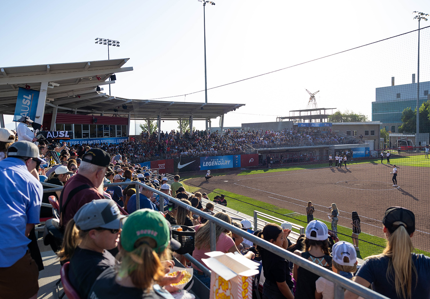 Fans fill the stands of Dumke Family Softball Stadium during an AUSL game between the Talons and Blaze.