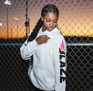 Aliyah Andrews in white Blaze hoodie